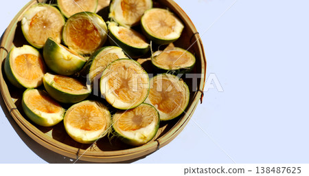 Sliced betel nuts in a tray. 138487625
