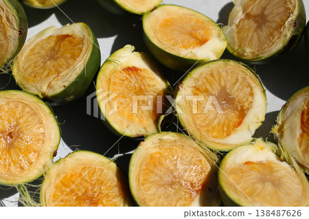 Sliced betel nuts in a tray. 138487626