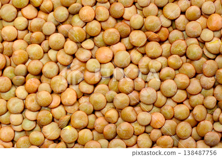 Lentils are small brown legumes rich in protein and fiber Lentils are small brown legumes rich in protein and fiber 138487756