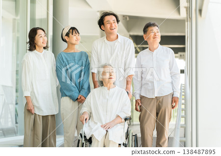 A three-generation family visiting a hospital or nursing home A three-generation family visiting a hospital or nursing home 138487895