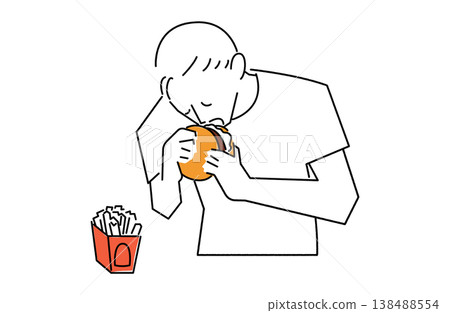 A man biting into a hamburger 138488554