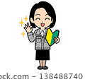 A female office worker with a one-curl bob haircut holds up a beginner driver's sticker and says OK. 138488740