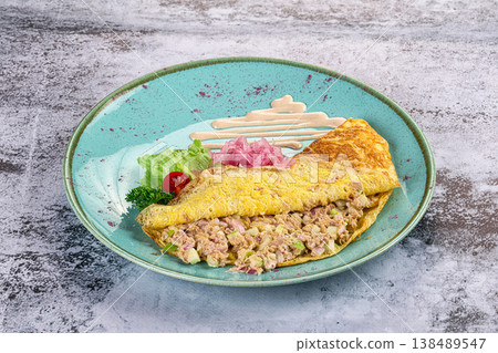 Omelet witn canned tuna and onion Omelet witn canned tuna and onion 138489547