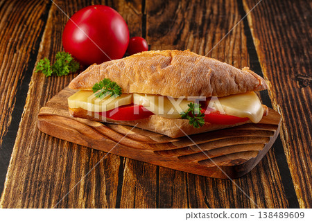 Sandwich with mozzarella and tomato Sandwich with mozzarella and tomato 138489609