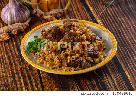 Asian traditional pilaf with beef Asian traditional pilaf with beef 138489613