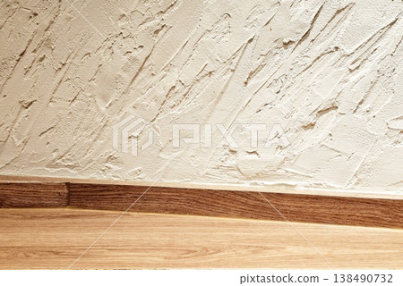 White Plastered Wall with Wooden Floor, Suitable for Product Presentation Backdrop, Display, and Mock up White Plastered Wall with Wooden Floor, Suitable for Product Presentation Backdrop, Display, and Mock up 138490732