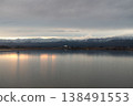 The snow-covered Hakusan mountain range and Shibayama Lagoon bathed in the morning light. 138491553
