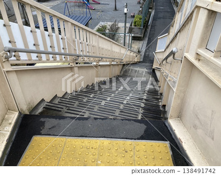 Stairs of a pedestrian overpass 138491742
