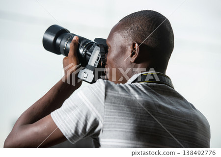 close up of man with camera. close up of man with camera. 138492776