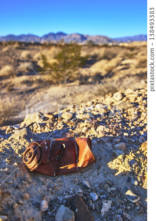 Rusty Spray Can in Desert Landscape at Golden Hour Near Las Vegas 138493383