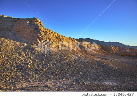 Golden Hour Sunlight on Rugged Tule Springs Fossil Bed Rock Formations 138493427