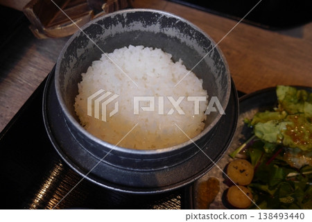 Rice cooked in a traditional iron pot 138493440