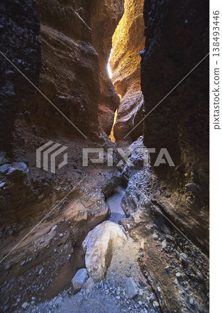 Spooky Canyon Arizona Dramatic Slot Canyon Rock Walls and Sunlit Passage Spooky Canyon Arizona Dramatic Slot Canyon Rock Walls and Sunlit Passage 138493446