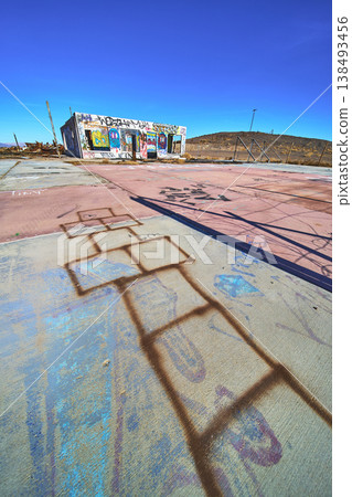 Abandoned Graffiti Covered Building and Hopscotch Grid at Lake Dolores Water Park Abandoned Graffiti Covered Building and Hopscotch Grid at Lake Dolores Water Park 138493456
