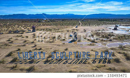 Aerial Liberty Sculpture Park Sign Monumental Sculptures Desert Landscape California 138493471
