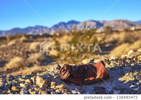 Rusty Spray Can Abandoned in Nevada Desert at Golden Hour 138493472