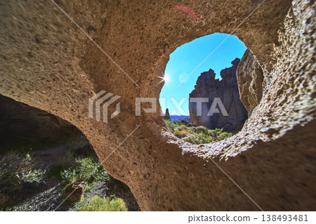 Sunburst Through Rock Arch Natural Hole Mojave Desert Landscape California Sunburst Through Rock Arch Natural Hole Mojave Desert Landscape California 138493481