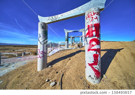 Graffiti Covered Concrete Pillars at Abandoned Lake Dolores Water Park in California 138493657