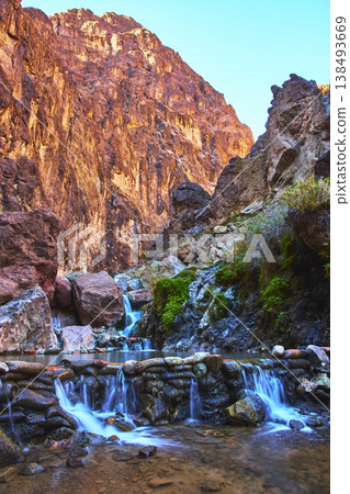 Goldstrike Hot Spring Waterfall and Geothermal Pools Among Rugged Nevada Canyon Goldstrike Hot Spring Waterfall and Geothermal Pools Among Rugged Nevada Canyon 138493669