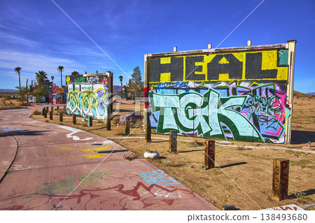 Abandoned Graffiti Covered Billboards and Concrete at Lake Dolores Water Park California 138493680