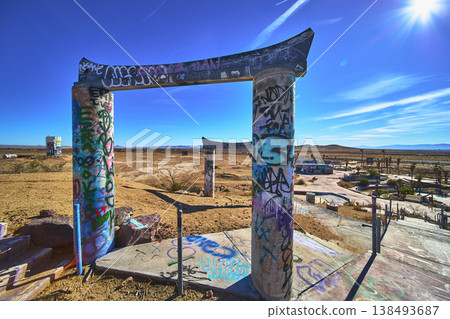 Graffiti Covered Entrance Pillars and Deserted Lake Dolores Water Park Ruins California Graffiti Covered Entrance Pillars and Deserted Lake Dolores Water Park Ruins California 138493687