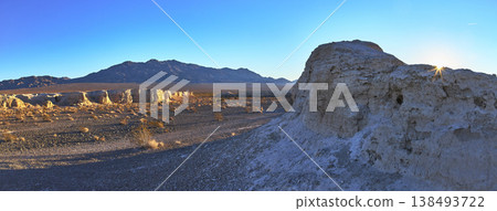 Tule Springs Fossil Beds Panoramic Landscape with Sunburst and Distant Mountains Tule Springs Fossil Beds Panoramic Landscape with Sunburst and Distant Mountains 138493722