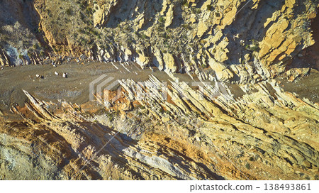 Aerial Rugged Rock Formations and Dry Wash at Anniversary Mine Nevada Top Down 138493861
