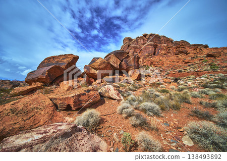 Red Rock Canyon Dramatic Boulders and Desert Landscape Under Bright Blue Sky 138493892