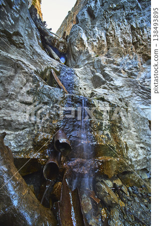 Waterfall Flowing Over Rocky Cliff With Rusted Pipes Mt Charleston Waterfall Flowing Over Rocky Cliff With Rusted Pipes Mt Charleston 138493895