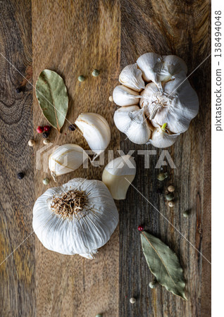 Garlic Cloves on Rustic Wood Garlic Cloves on Rustic Wood 138494048