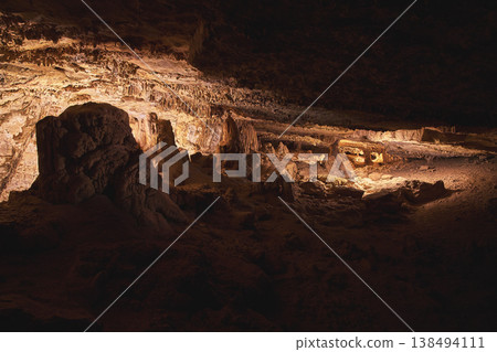 Cavern Interior with Rock Formations and Dramatic Light Painting in Cowboy Canyon Cavern Interior with Rock Formations and Dramatic Light Painting in Cowboy Canyon 138494111