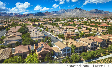Aerial Las Vegas Nevada Residential Neighborhood With Red Rock Mountains Scenic View Aerial Las Vegas Nevada Residential Neighborhood With Red Rock Mountains Scenic View 138494194