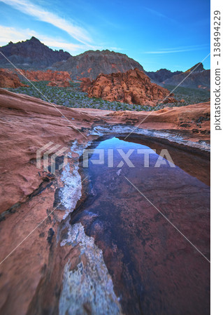 Redstone Dune Desert Tinaja Water Basin and Sunrise Rock Landscape Redstone Dune Desert Tinaja Water Basin and Sunrise Rock Landscape 138494229