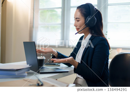 woman, call center agent or smile with voip for consulting, listening or contact us in office. Female consultant, customer service or tech support crm with headphones, microphone or help desk 138494291