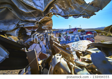 Graffiti Covered Abandoned Airplane Wreckage in Desert Near Beatty Nevada 138494355