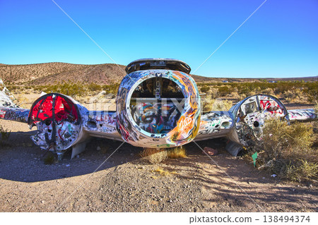 Abandoned Airplane with Colorful Graffiti in Nevada Desert near Beatty 138494374