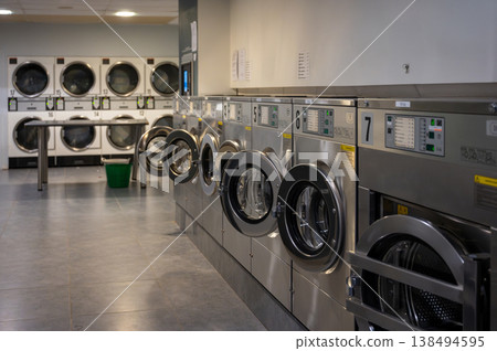 Row of washing machines in Public laundromat Row of washing machines in Public laundromat 138494595