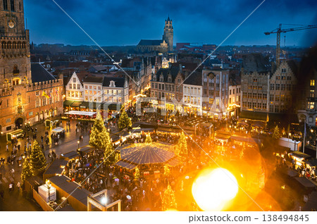Christmas market decorated and illuminated in Bruges, Belgium. 138494845
