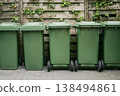 Colorful recycling bins on city street 138494861