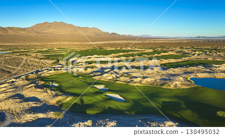 Aerial Golf Course Green Fairways and Desert Landscape at Golden Hour Las Vegas Nevada Aerial Golf Course Green Fairways and Desert Landscape at Golden Hour Las Vegas Nevada 138495032