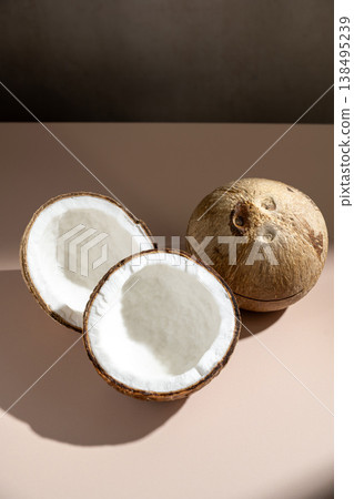 Fresh coconuts halves, copy space Fresh coconuts halves, copy space 138495239