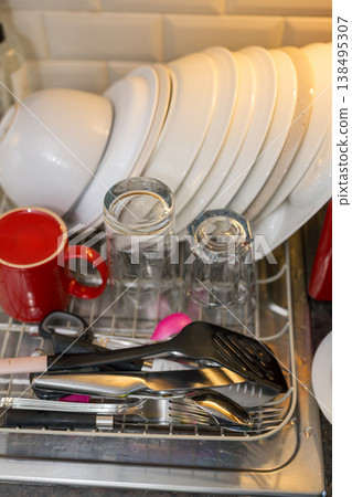 Clean, freshly washed dishes in the kitchen, home chores, daily routine Clean, freshly washed dishes in the kitchen, home chores, daily routine 138495307