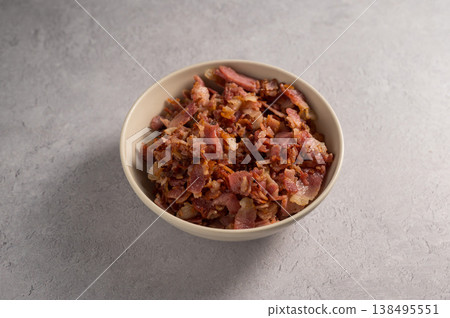 A pile of fried bacon in a bowl, cooking breakfast A pile of fried bacon in a bowl, cooking breakfast 138495551