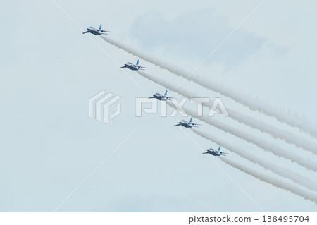 Blue Impulse trail formation performing a changeover turn. Blue Impulse trail formation performing a changeover turn. 138495704