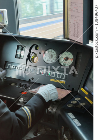 JR West Japan: Driver's cab of a local train in motion 138496437