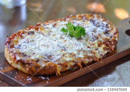 bread pizza , ham and cheese pizza or cheese pizza or Italian pizza 138497699