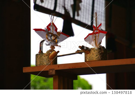 Offerings made before the gods at a shrine... "Sacred sake" Offerings made before the gods at a shrine... "Sacred sake" 138497818