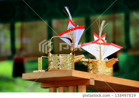 Offerings made before the gods at a shrine... "Sacred sake" Offerings made before the gods at a shrine... "Sacred sake" 138497819