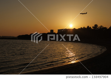 The coast and airplanes at sunset The coast and airplanes at sunset 138497904