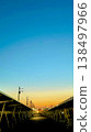 The road home at dusk and a residential area 138497966